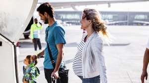 Family getting on a plane