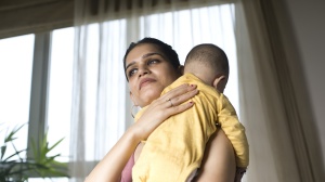 Parent holding baby