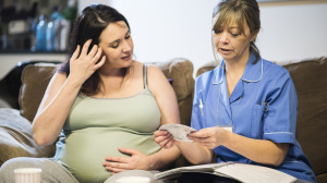 Midwife and pregnant woman or person