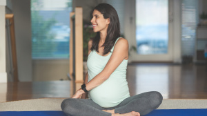 Pregnant woman practising yoga