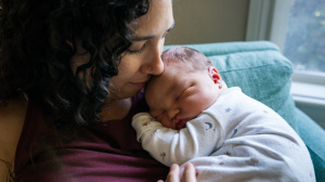 Mother holding newborn baby