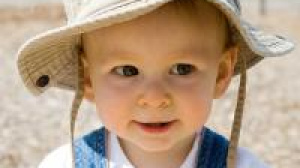 Toddler in sun hat