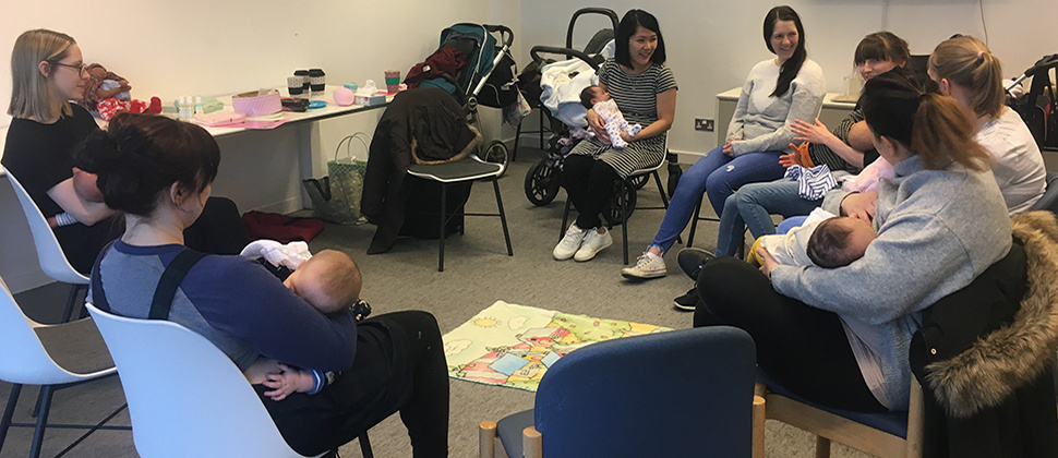 Group of breastfeeding mums in the Discovery Room at John Lewis