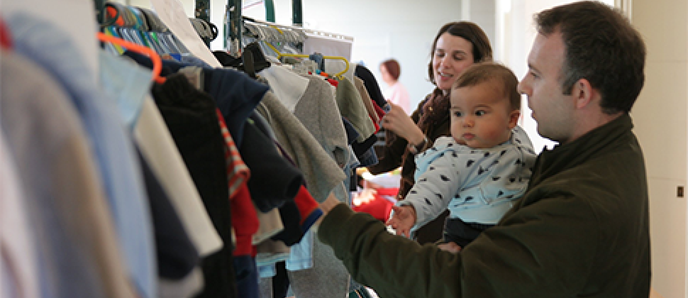 Dad and baby looking at clothes