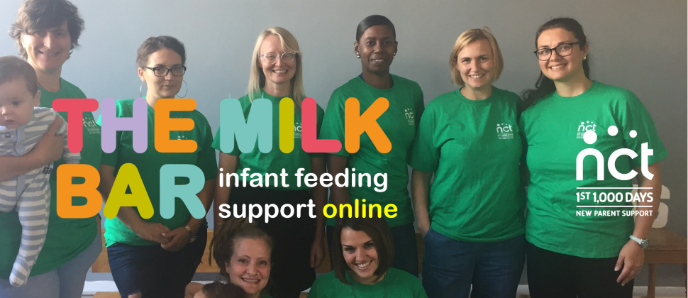 Two rows of breastfeeding peer supporters, some in green t shirts, all smiling