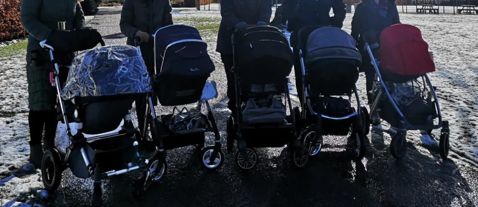 pushchairs in snowy park