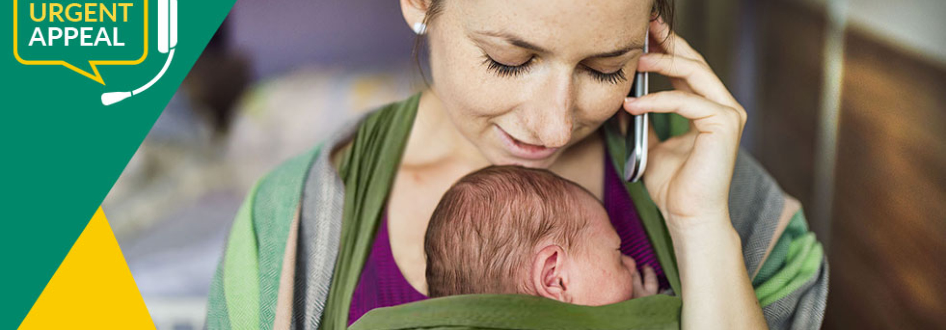 Parent feeding a baby